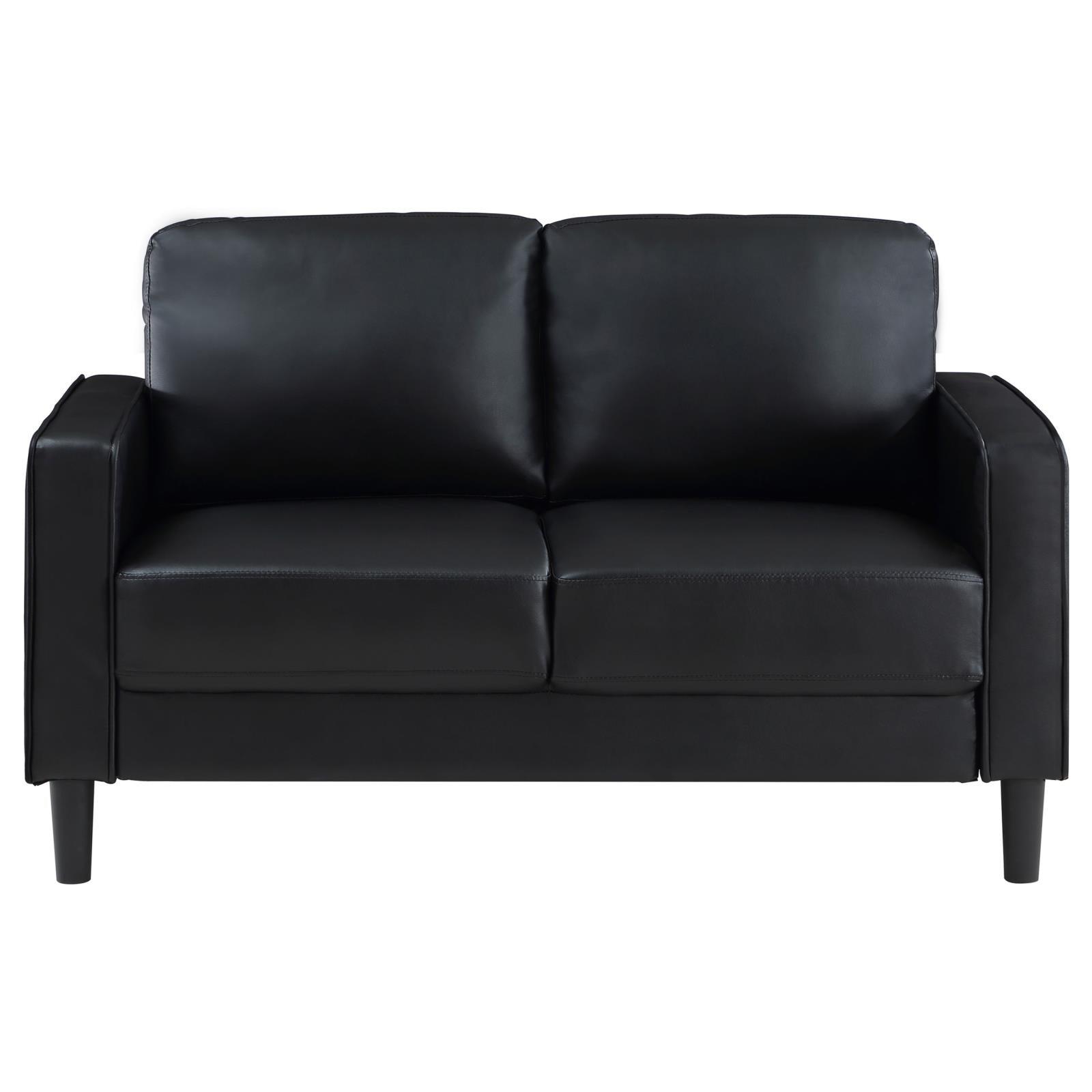 Ruth Black Faux Leather Upholstered Track Arm Loveseat close-up of track arm