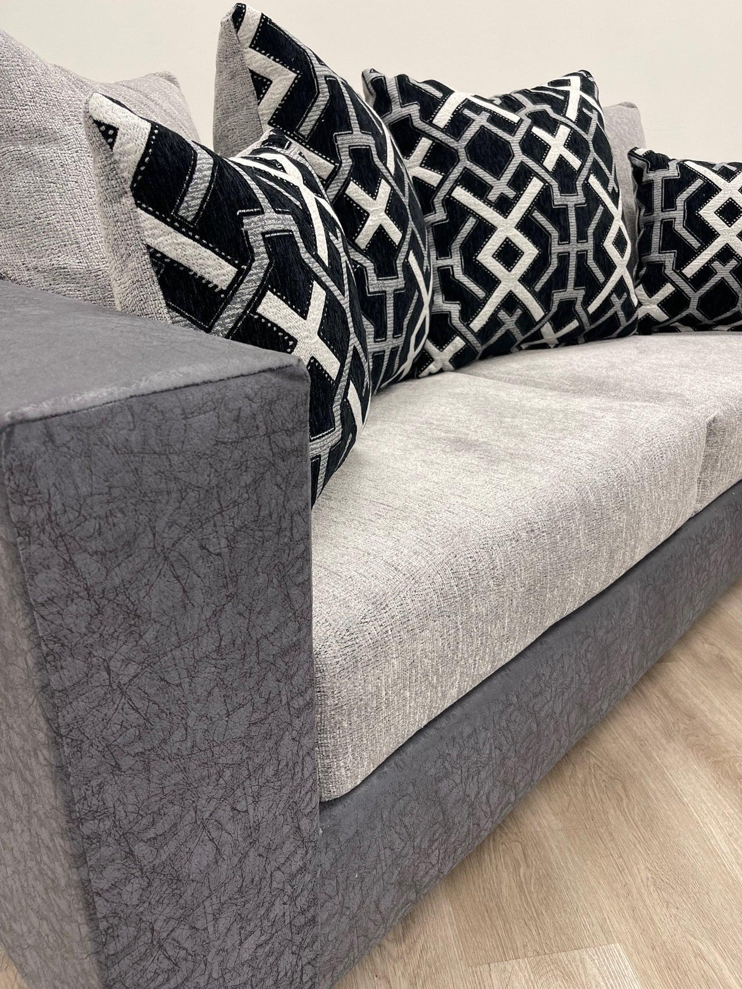 Side view of Monroe gray fabric sofa and loveseat set
