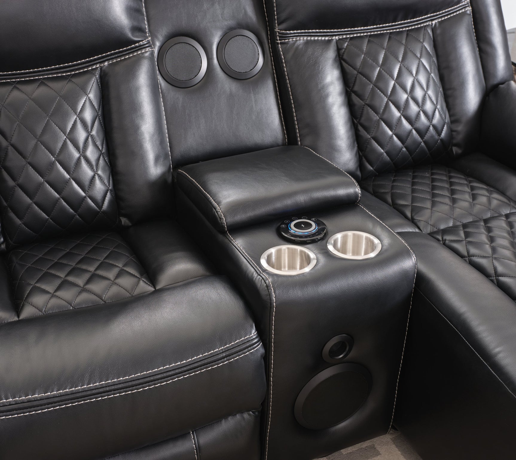 Side view of the push-back chaise on Champion black reclining sectional