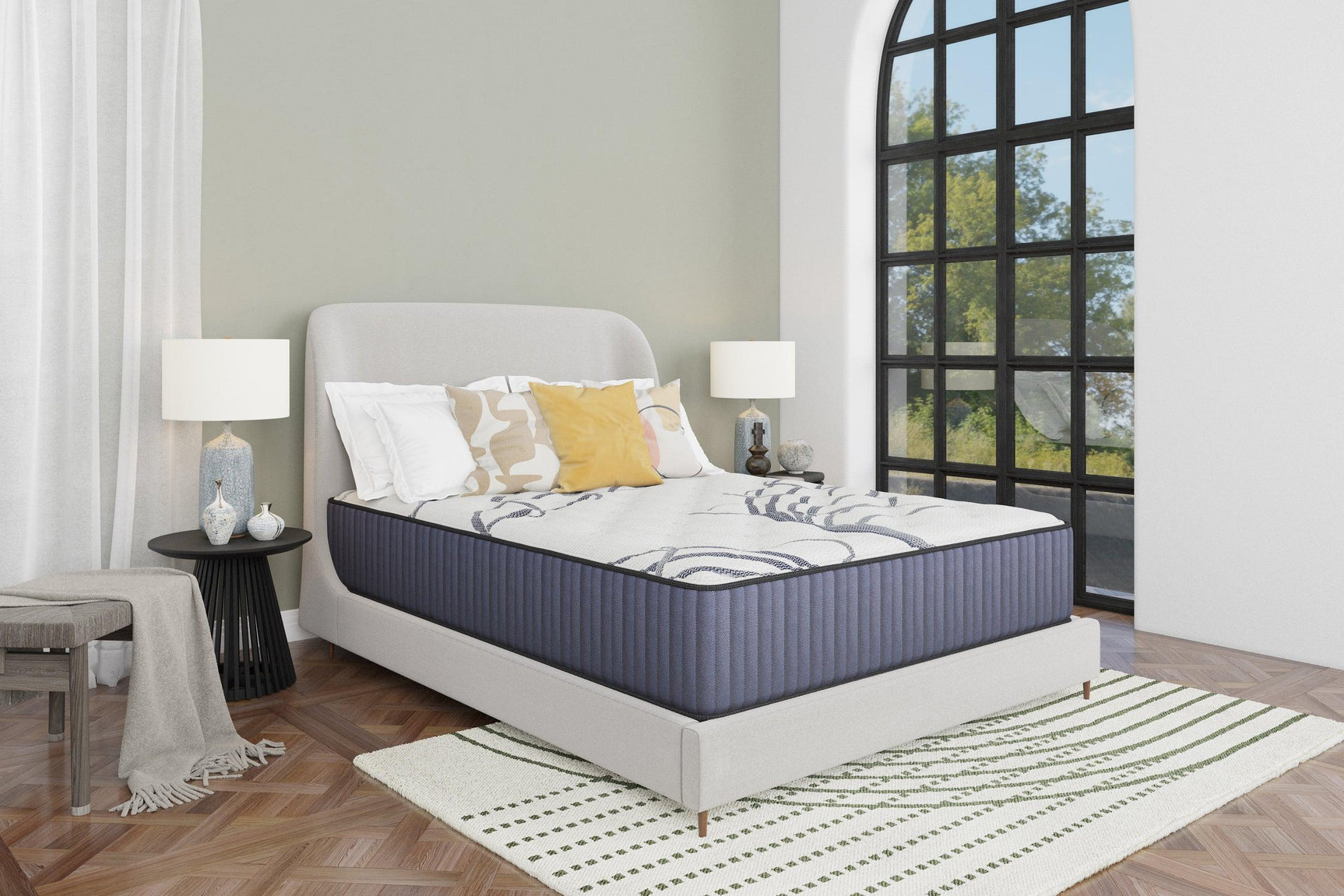 Side angle of Grand Hybrid Medium King Mattress showing thickness and design details