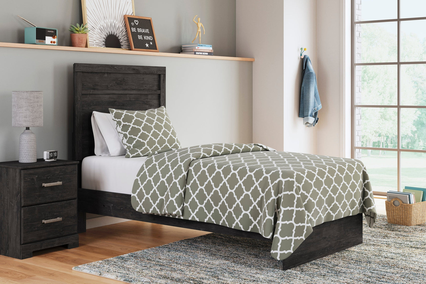 Side view of John Black Panel Bedroom Set charcoal bed