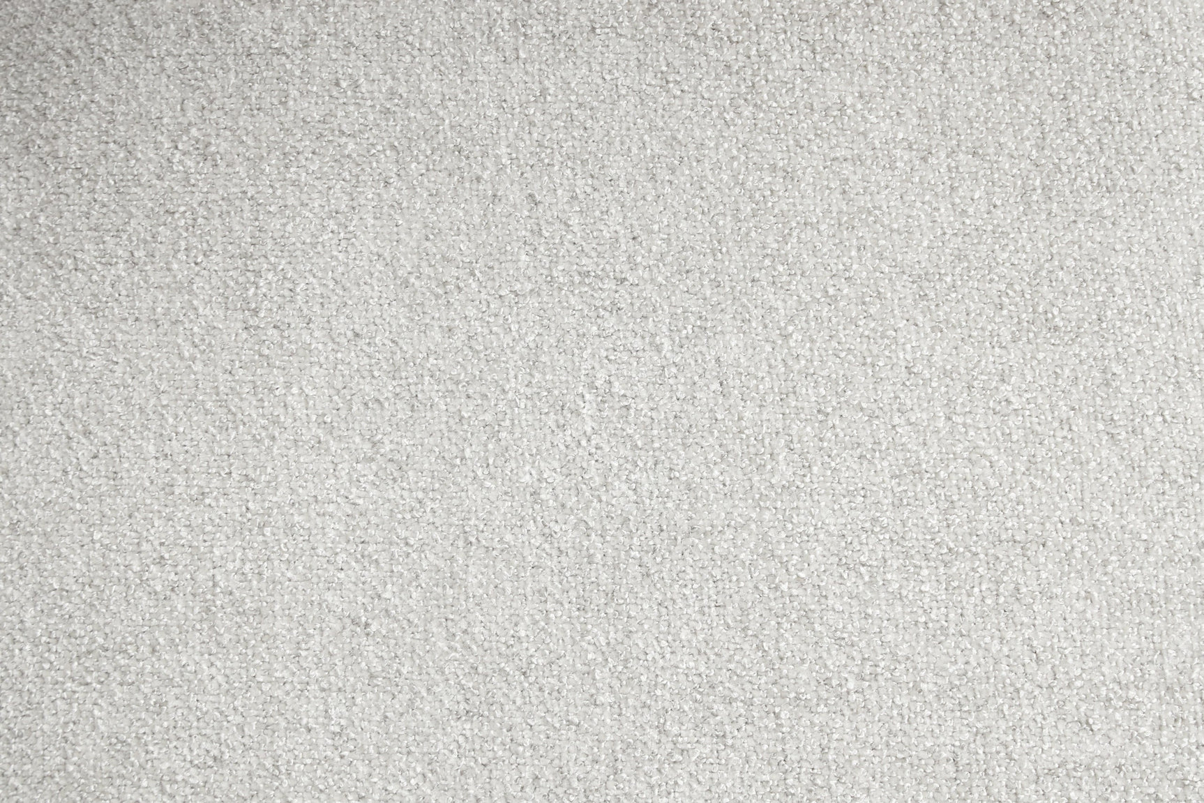 Close-up detail of gray fabric upholstery on Manhattan Sectional sofa