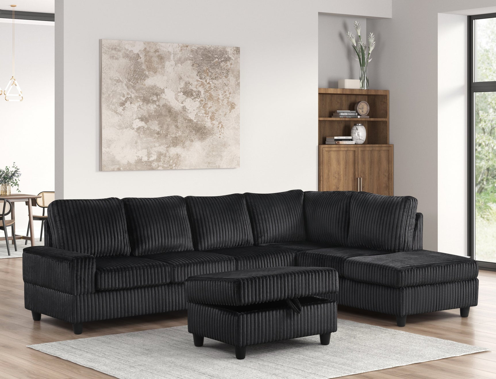 side view of Heights Black Cord Fabric Reversible Sectional + Ottoman sectional sofa