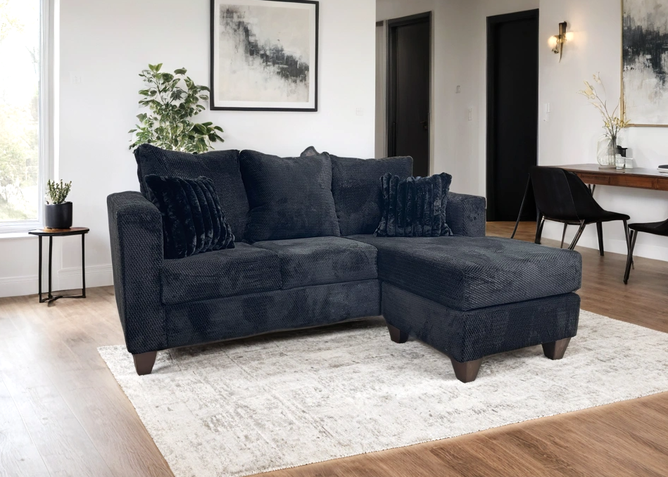 Side view of Omni Black Reversible Sectional sofa showing reversible design
