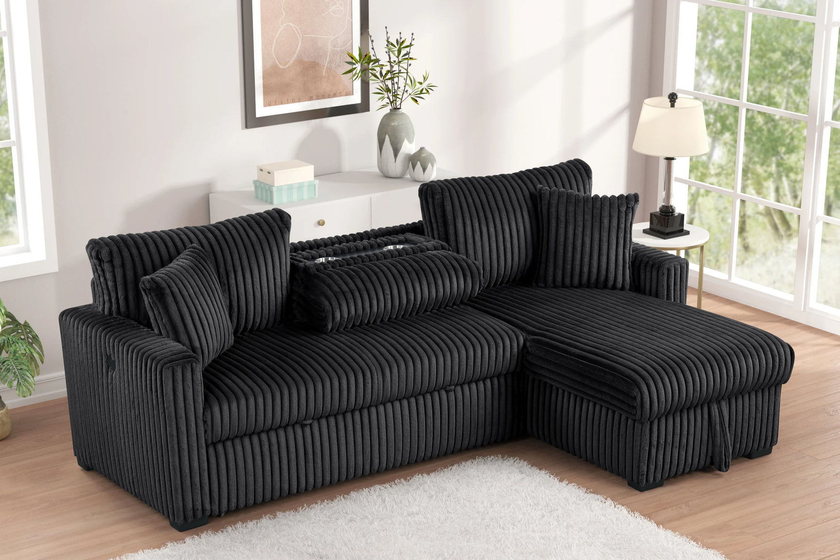 Side view of Aria Black Fabric Sectional Sofa with Pull-Out Bed and Storage Chaise