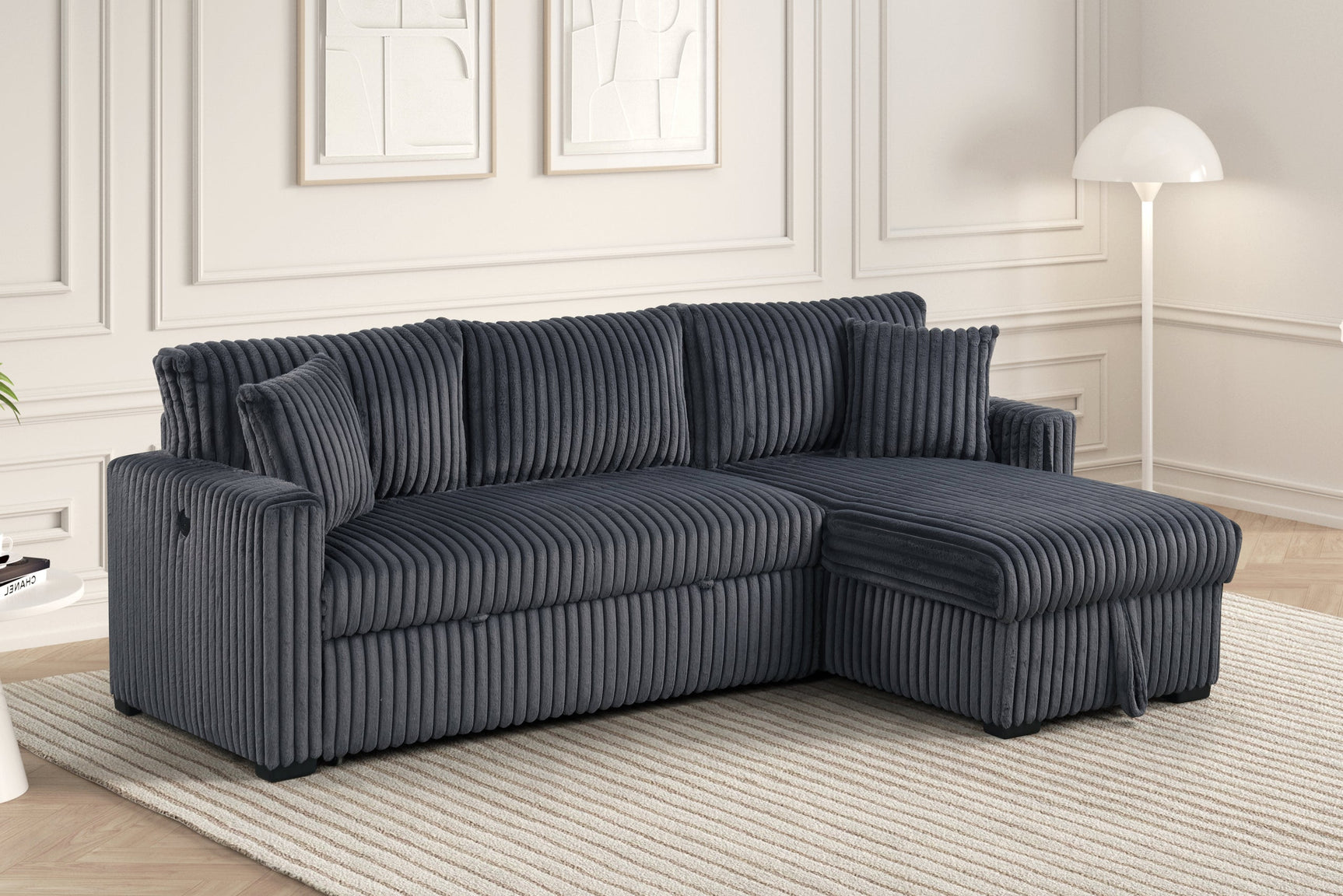 Close-up detail of charcoal cord fabric on Aria sectional
