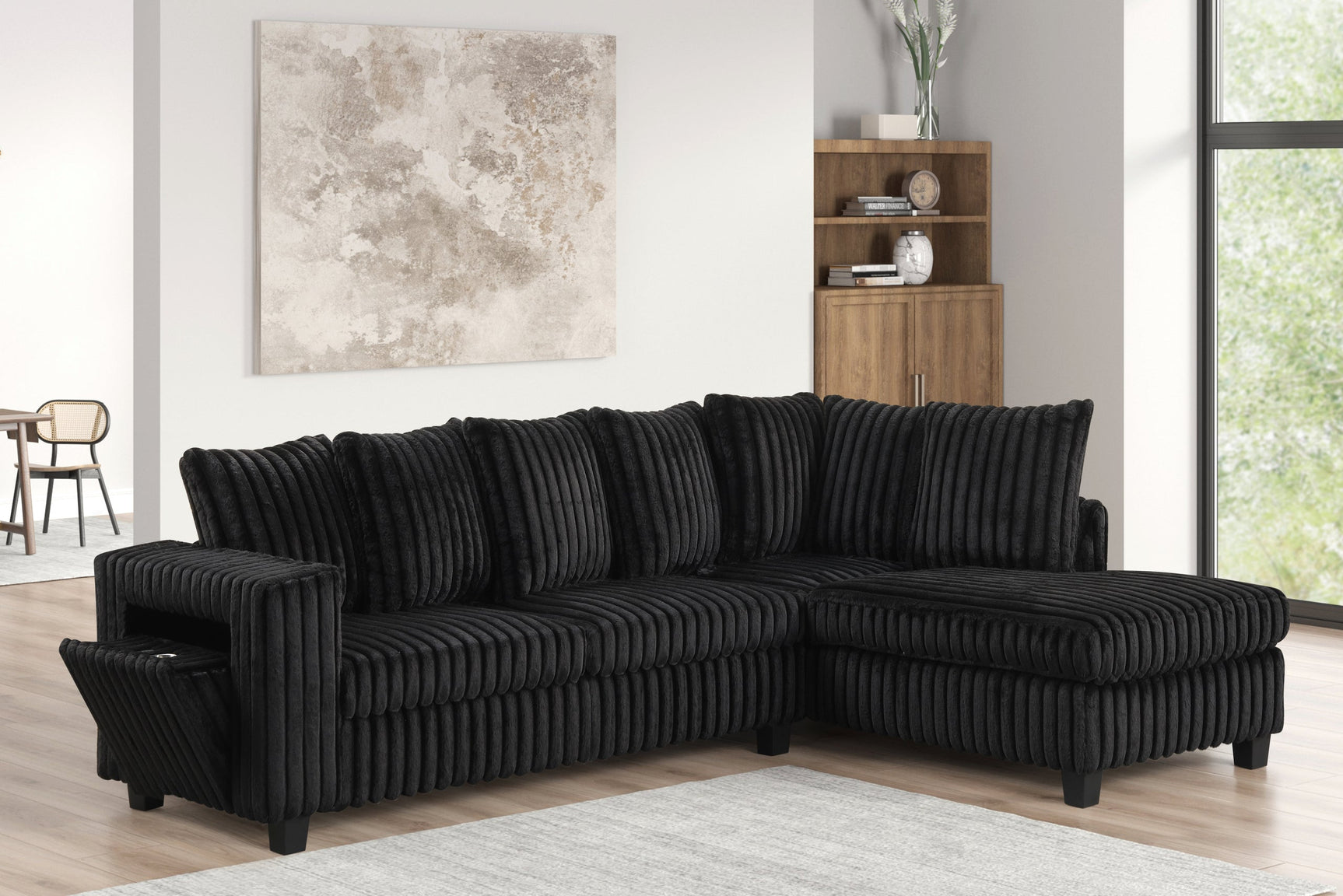 Detail view of Fiven Black Reversible Sectional sofa