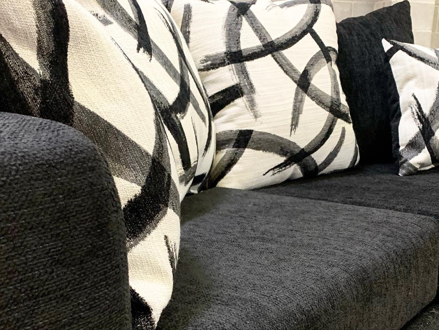 Monroe Black Chenille Fabric Sofa and Loveseat Set side view