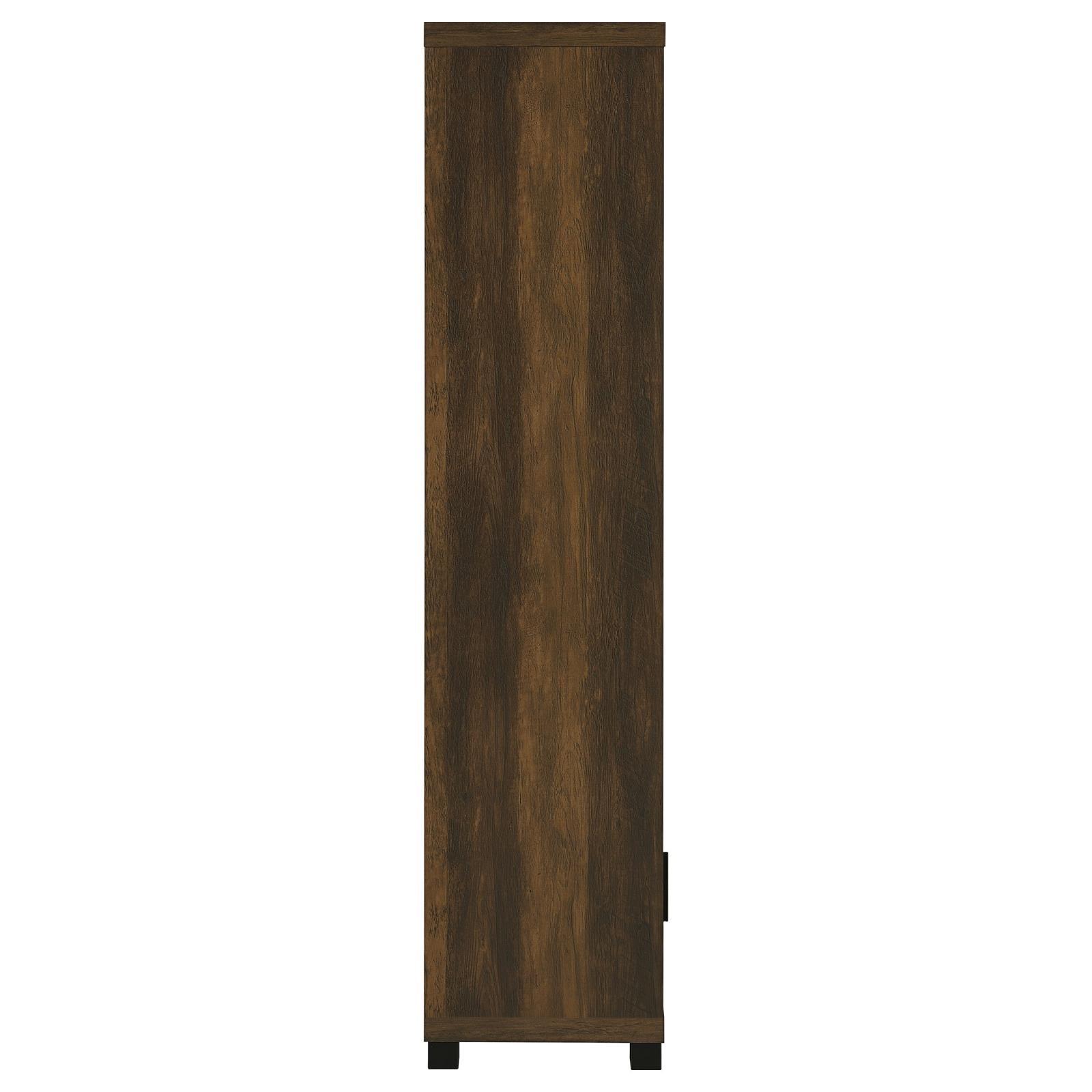 Dark pine media tower assembled in living room setting