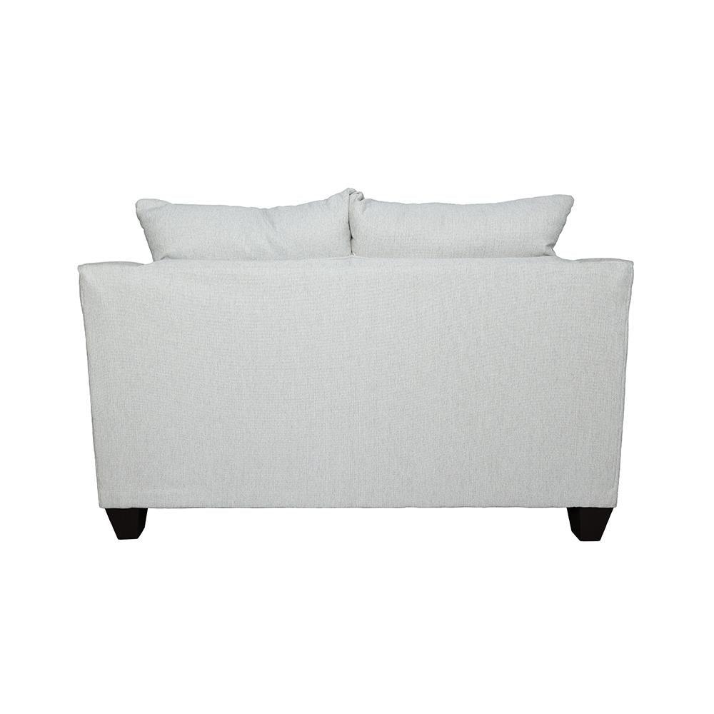 Overview of Salizar Upholstered Loveseat in a living room setting