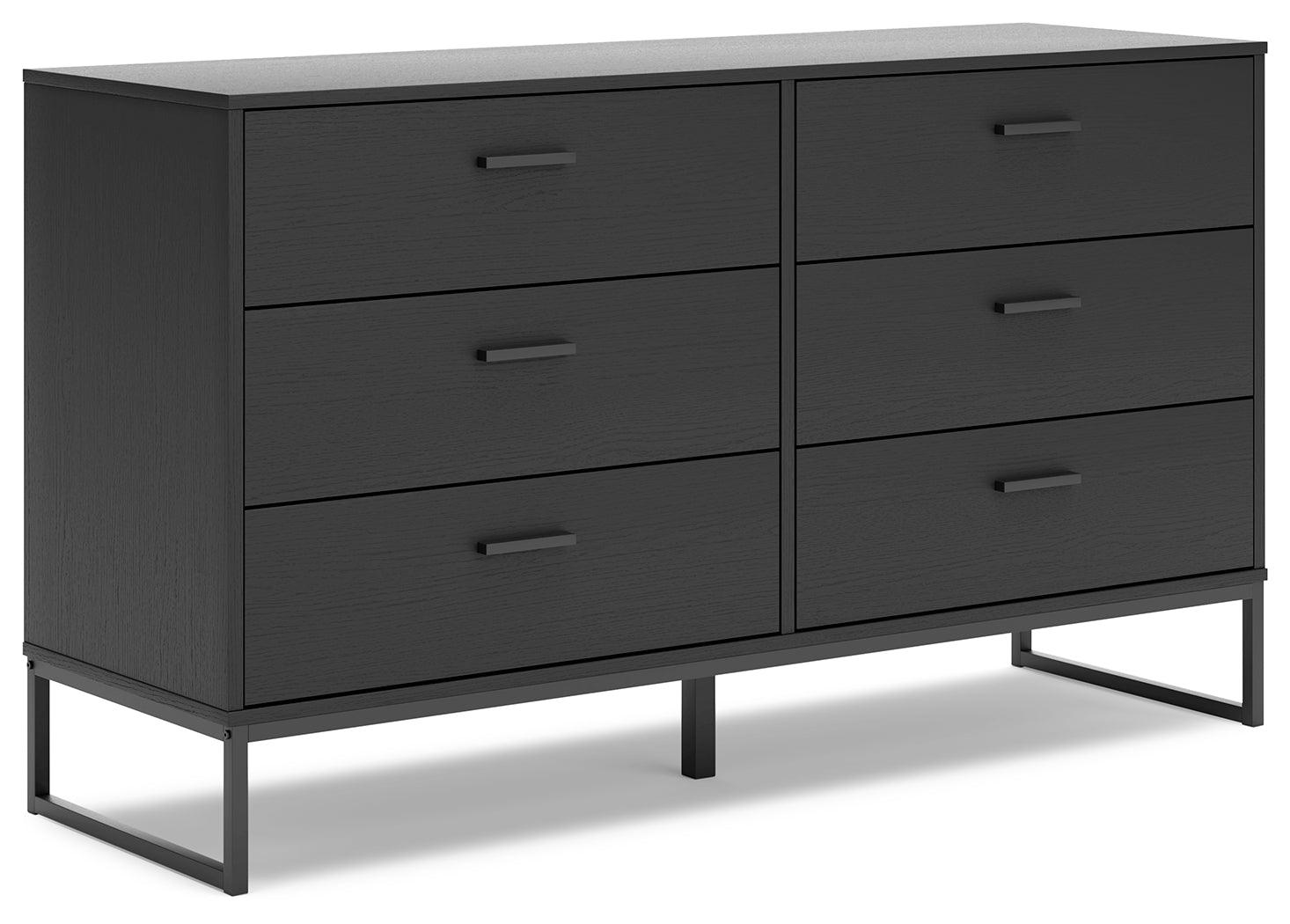 Side angle of Socalle black dresser highlighting dark pewter-tone legs