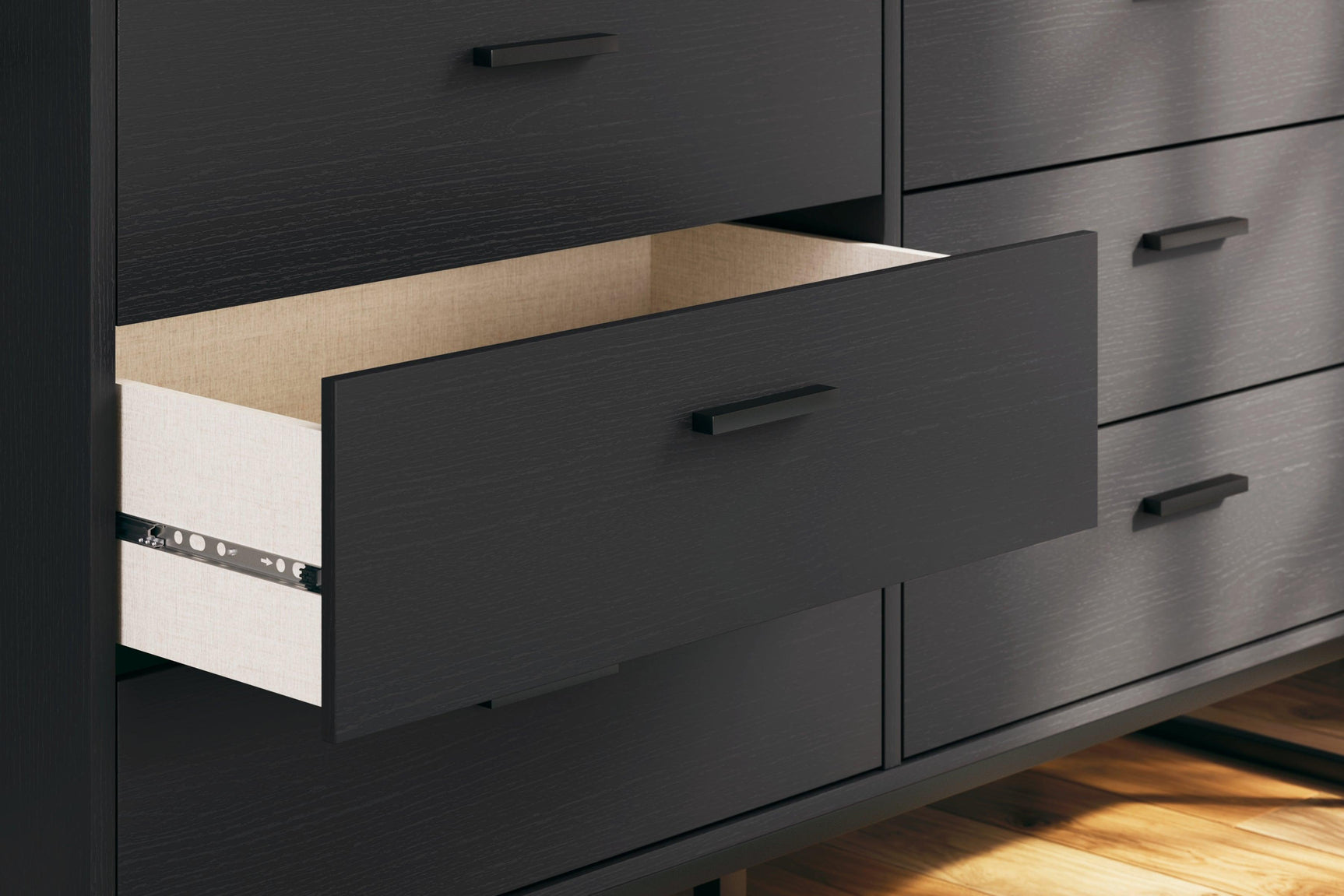 Opened drawer of Socalle dresser portraying smooth-glide mechanism