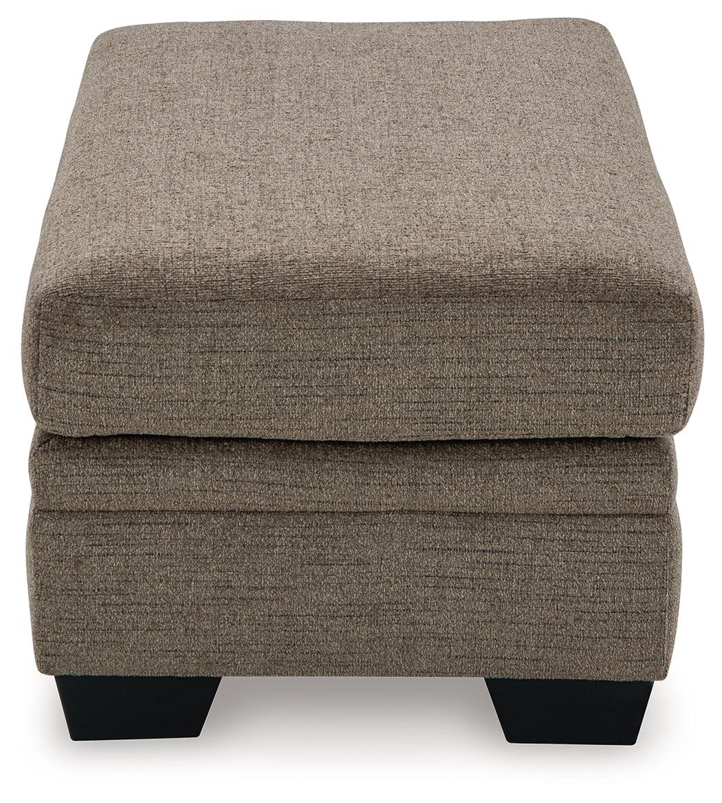 Stonemeade Nutmeg Chenille Ottoman shown in a living room setting