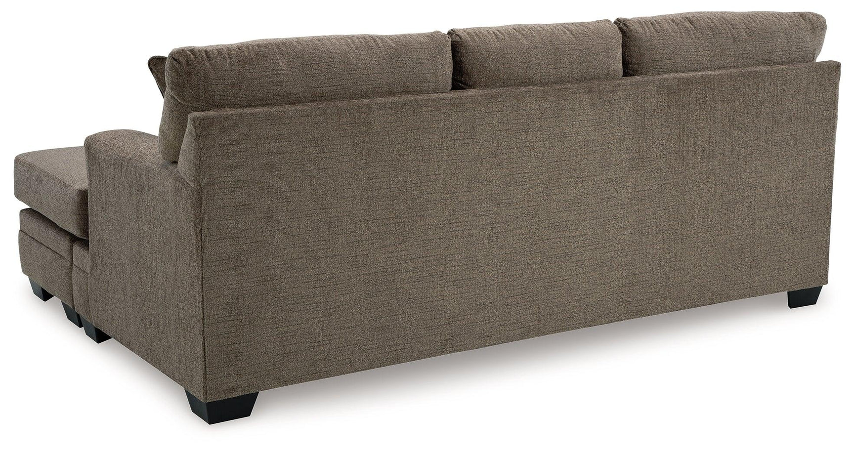 Exposed feet with faux wood finish on sofa chaise