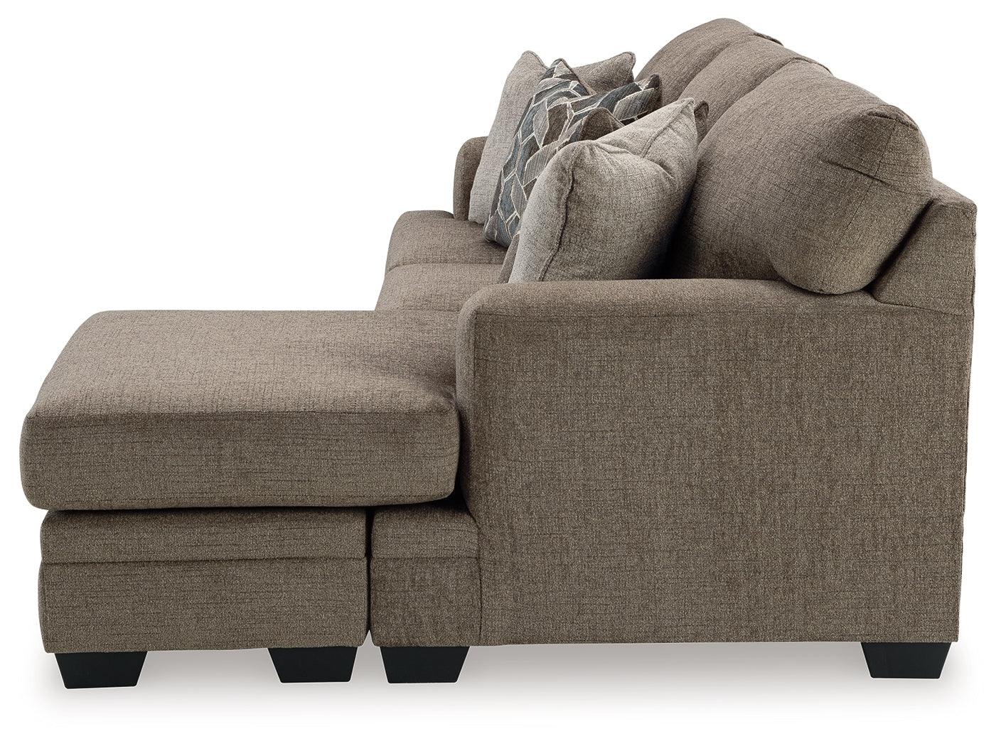 Side profile of sofa chaise with movable ottoman