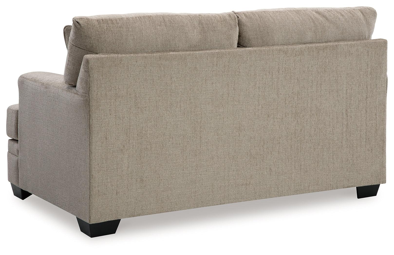 Stonemeade loveseat with accent pillows arranged