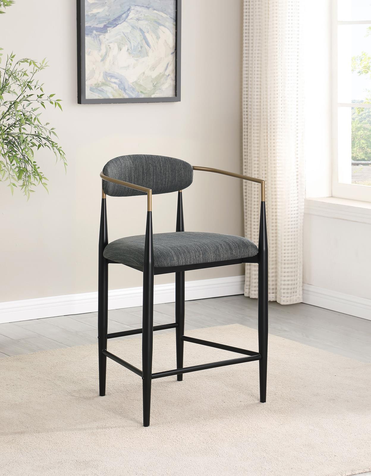 Side view of Tina metal counter height bar stool with padded seat and footrest