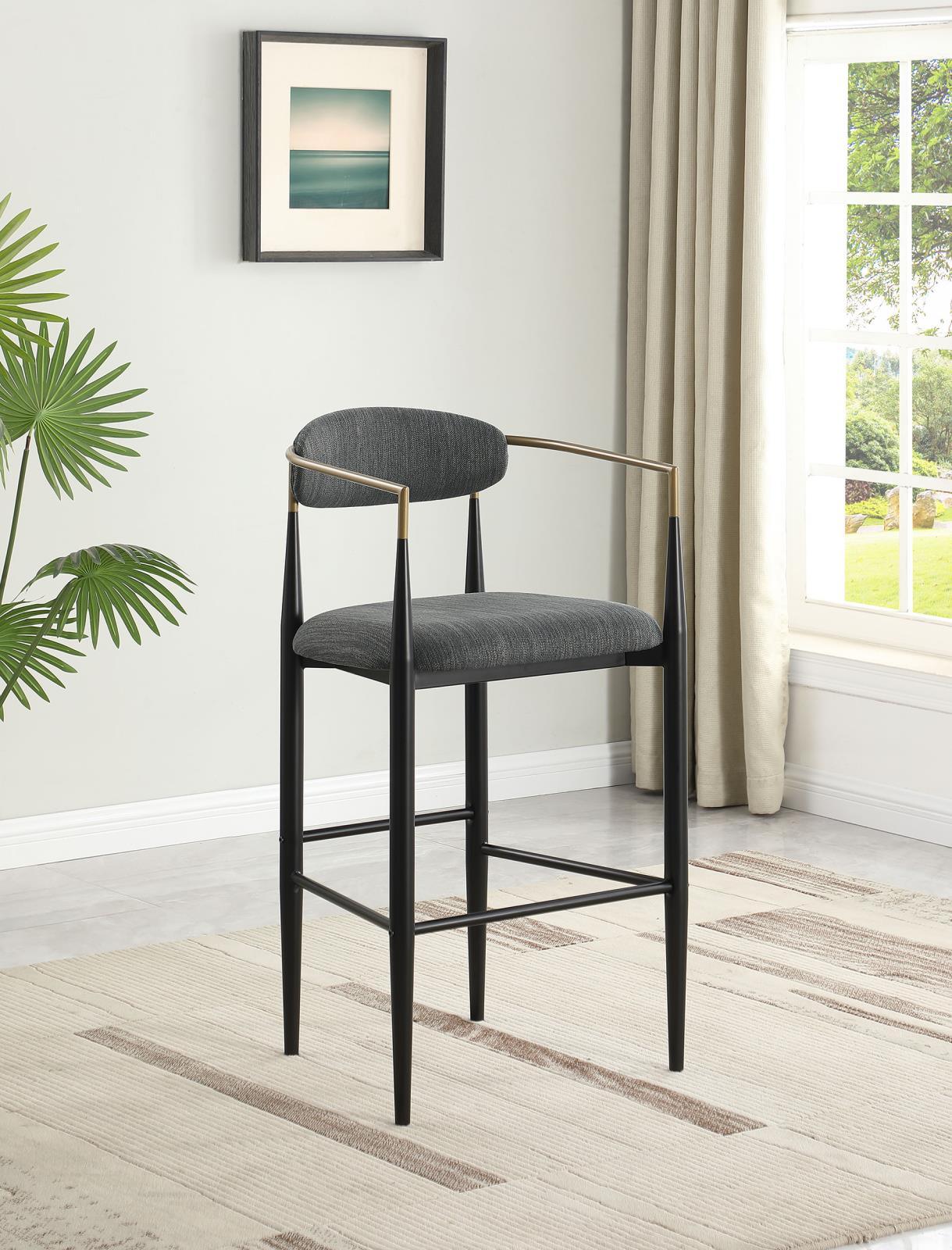 Tina set of 2 pub height bar stools, front angle showing upholstery and frame