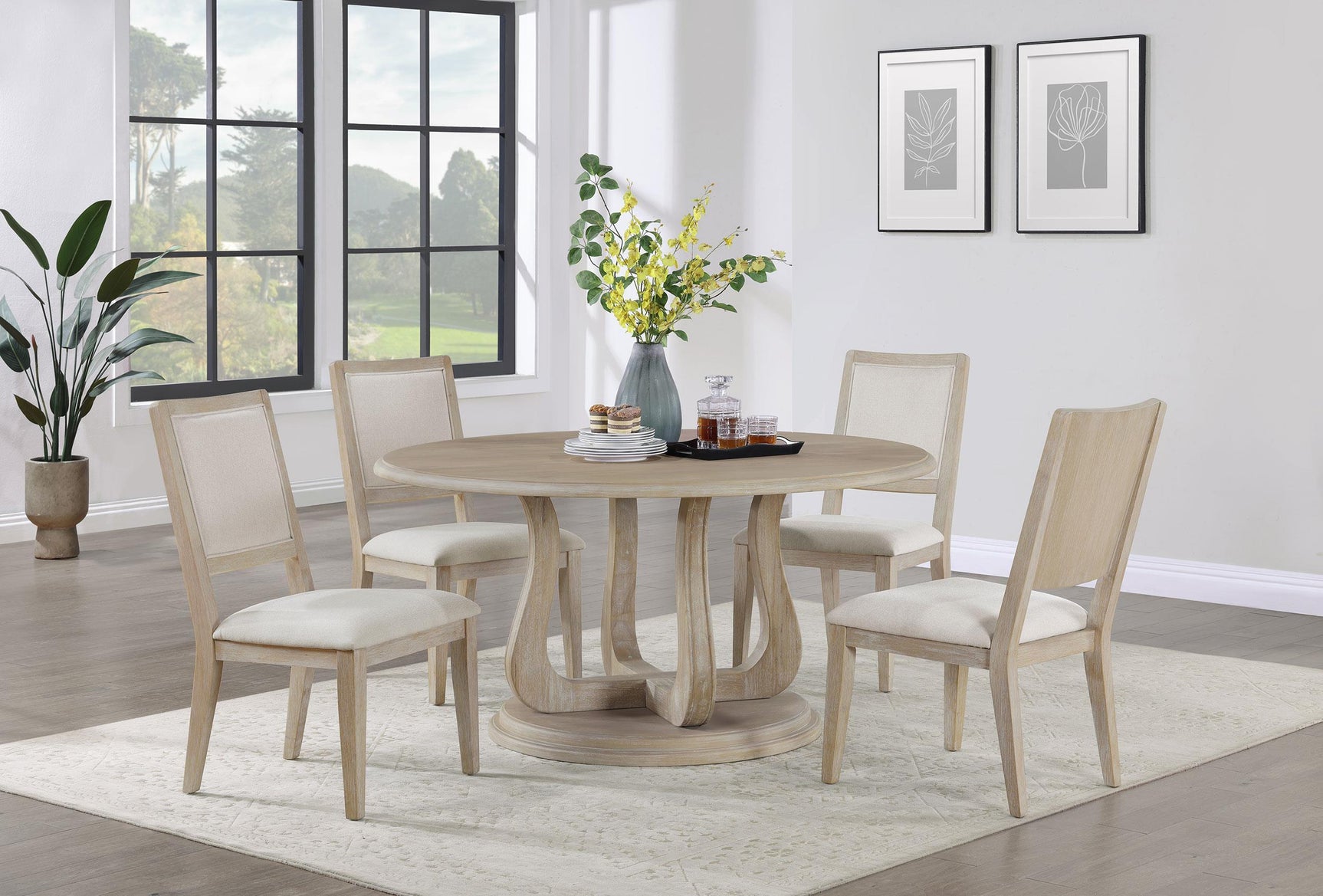 Trofello round 60-inch white washed pedestal dining table in room setting