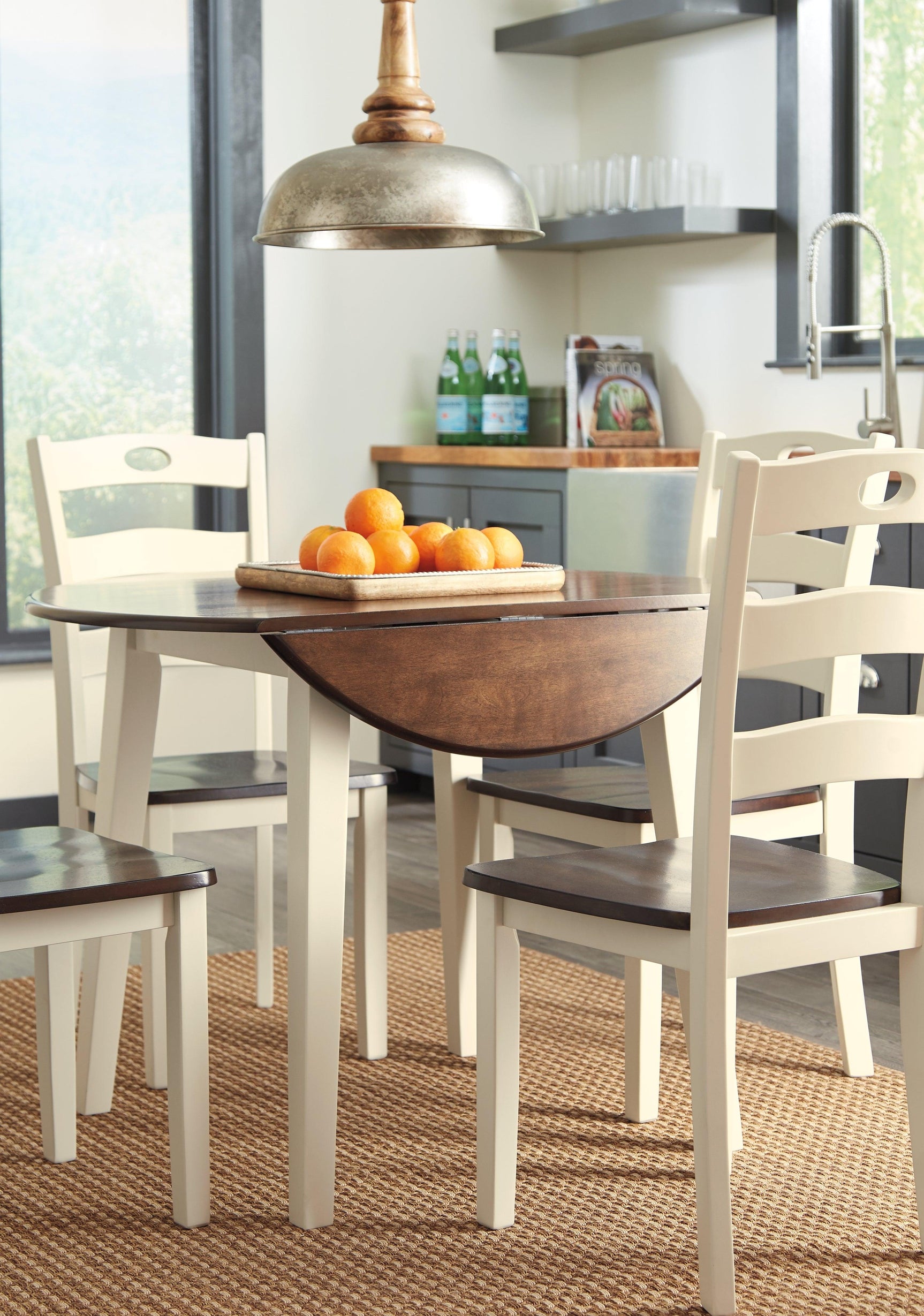 Woodanvill Cream Browne round dining room set detailed close-up