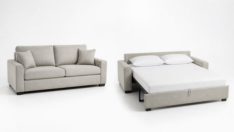 Modern sleeper sofa shown as a sofa and fully extended pull-out bed on white background