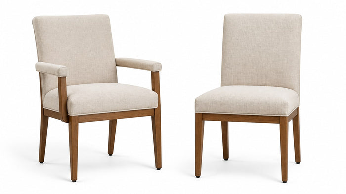 Pair of modern dining chairs on white background: armchair with arms and armless side chair