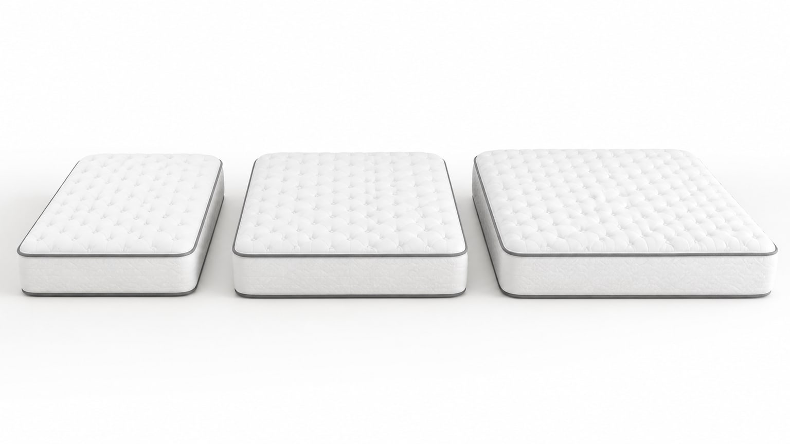 Comparison of queen, full, and king mattresses displayed on modern bed frames side-by-side against a white background in a furniture showroom.