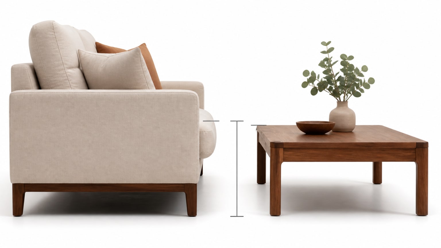 Modern coffee table in front of sofa showcasing ideal height proportions on white background