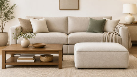 Wood coffee table and fabric ottoman displayed side by side on white background