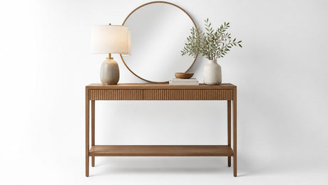 Modern wooden console table with open legs on white background under studio lighting