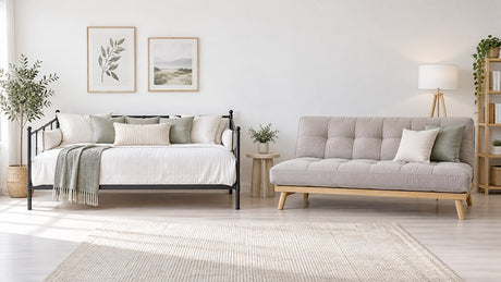 Stylish daybed with extended trundle in a bright neutral small bedroom setting