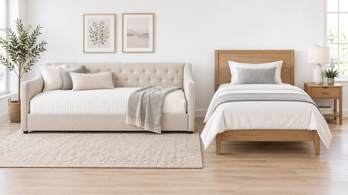 Wooden daybed in a bright white bedroom with twin mattress and neutral bedding.