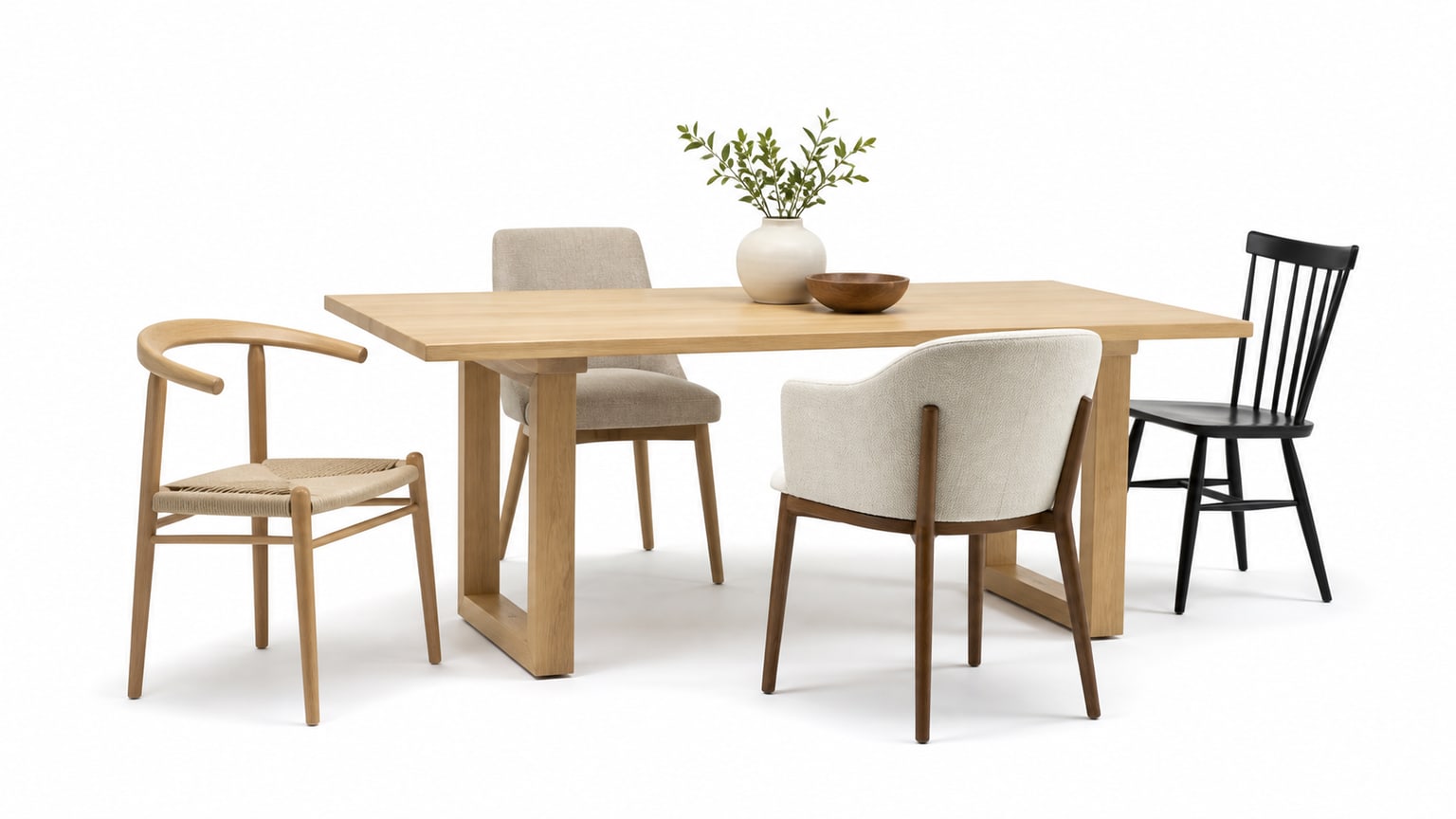Assorted stylish dining chairs including upholstered and wooden designs on a white background