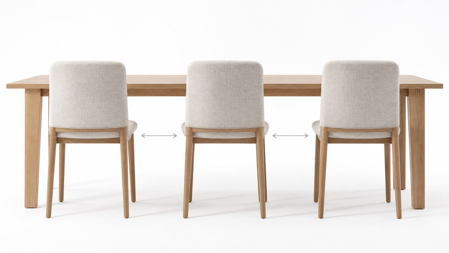 Variety of modern dining chairs arranged around a white dining table on a white background
