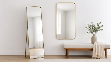 Modern floor mirror leaning against wall and wall mirror mounted side by side in minimalist setting, showing clear reflections and elegant frames