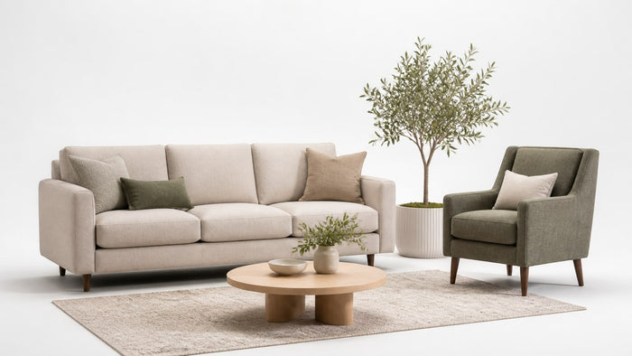 Modern accent chair matched with mid-century sofa coordinating upholstery and colors on white background