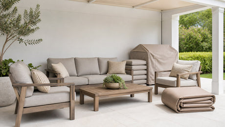 Modern outdoor patio furniture including sectionals and dining tables on bright white patio