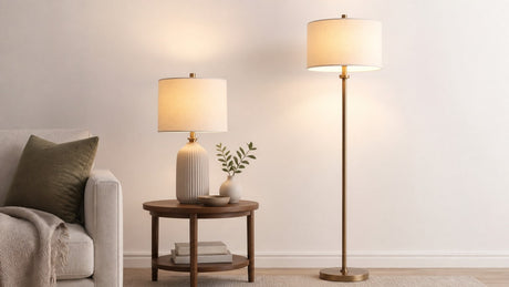 Living room scene with modern floor lamp and table lamp, softly illuminated with warm light on a white background.