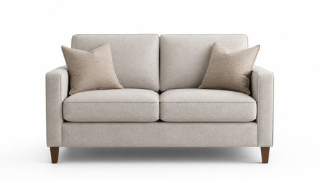 Compact two-seat fabric loveseat with armrests and cushions on white background, studio photography.