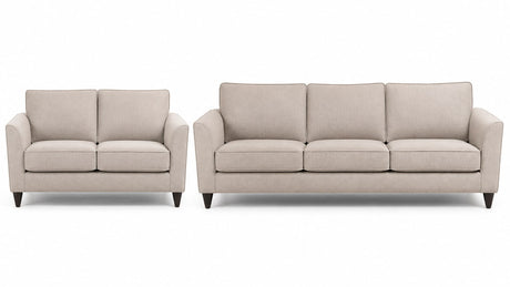 Modern two-seat loveseat with upholstered cushions and armrests on a white background in studio lighting.