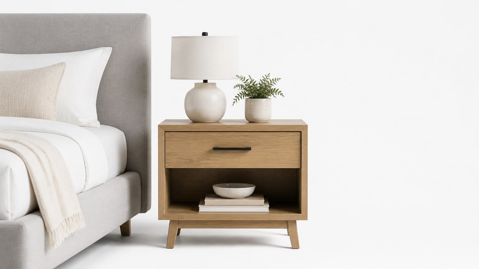 Modern wooden nightstand with drawer and open shelf on white background