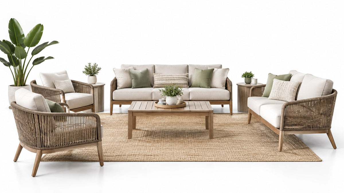 Modern outdoor patio seating arrangement with sectional sofa, lounge chairs, and loveseats on a bright white patio background