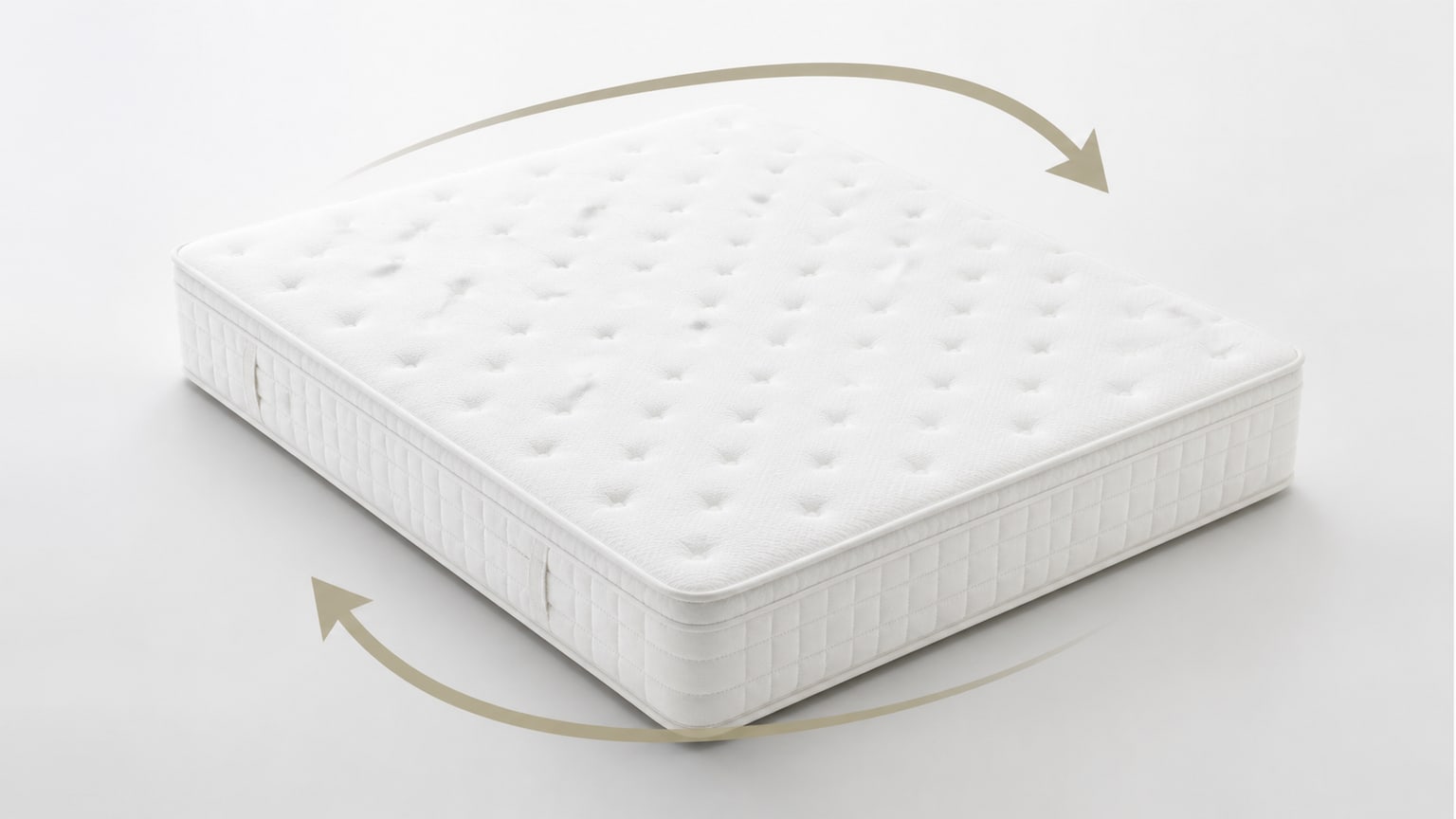 Modern mattress displayed on simple bed frame in professional studio, white background