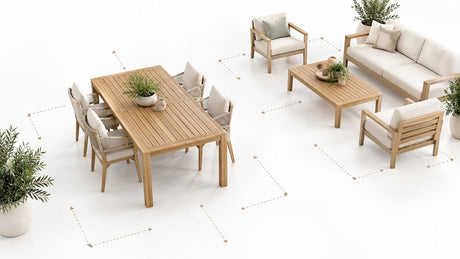 Modern outdoor dining table with chairs and umbrella on bright white patio