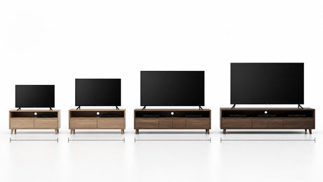 Modern TV stand with flat screen TV on a clean white studio background