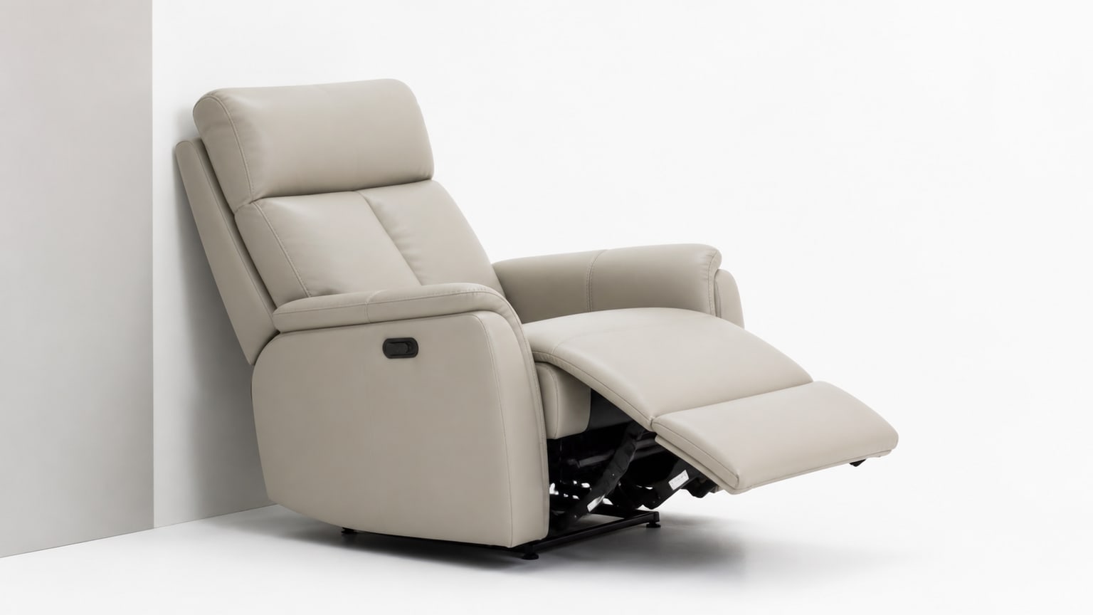 Modern wall hugger recliner chair on white background showing partial recline