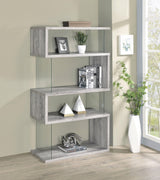 Front view of Emelle 4-shelf bookcase showing grey driftwood shelves and clear glass panels