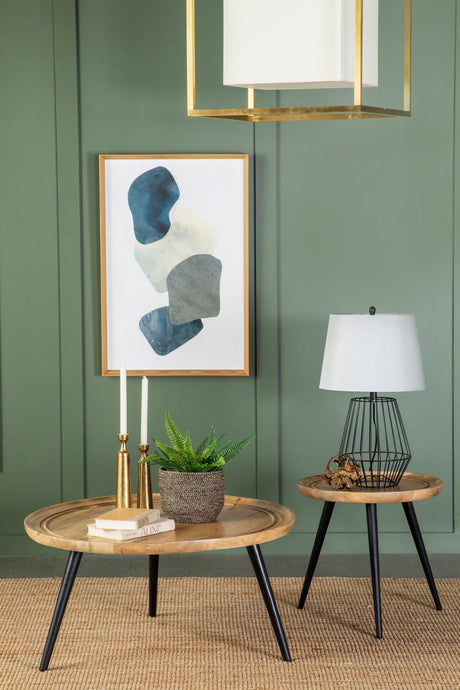 Zoe Round End Table with natural mango wood top and black iron tripod legs front view