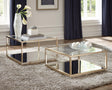 Renee 2-piece square occasional set with rose brass metal frame and glass top, angled view