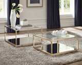 Renee 2-piece square occasional set with rose brass metal frame and glass top, angled view